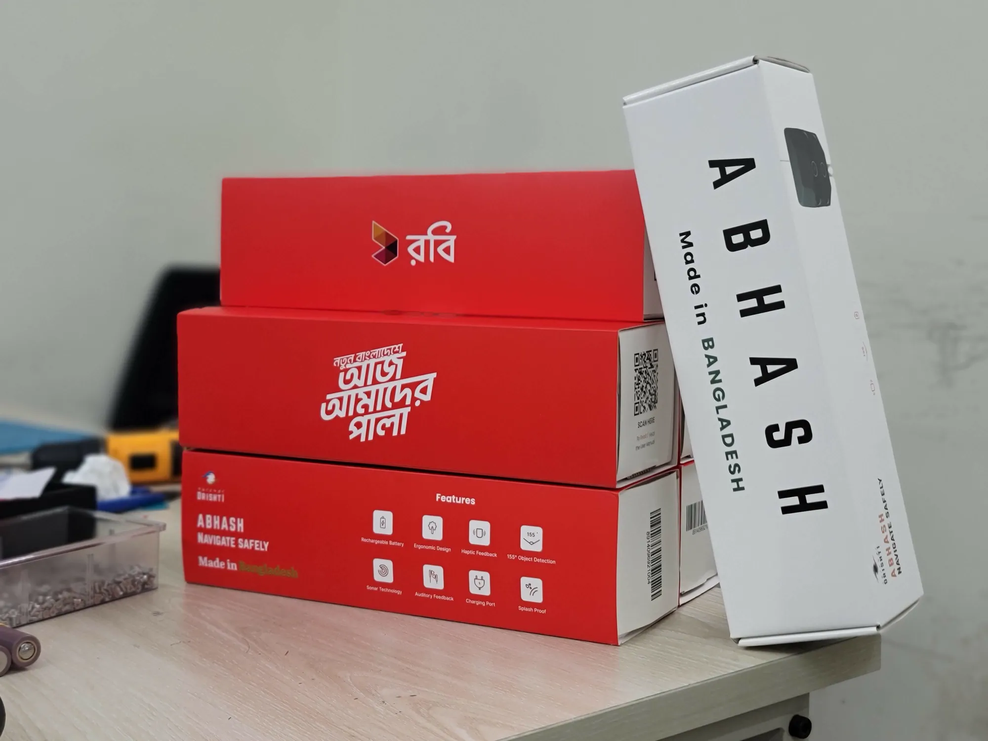 Abhash retail boxes in Robi red and white, marked Made in Bangladesh